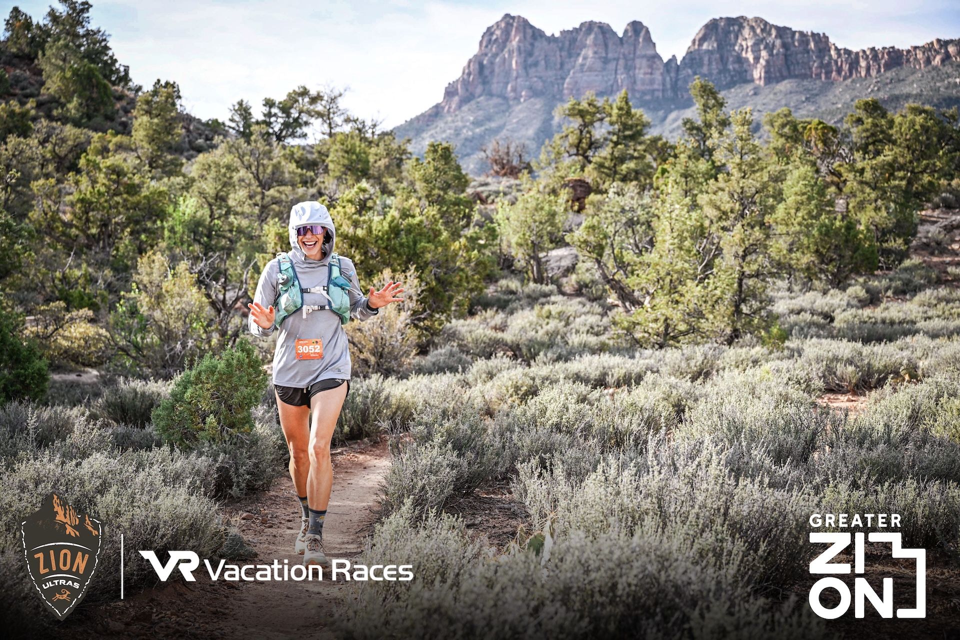 Runner waving zion ultra marathon